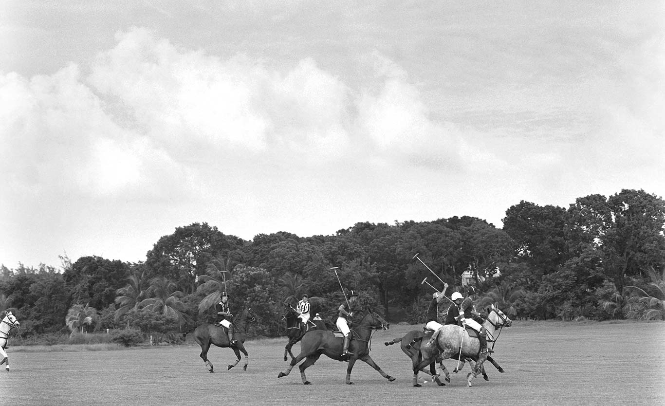 Greyscale image of polo match