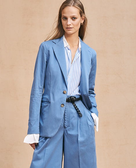 Woman in light blue blazer